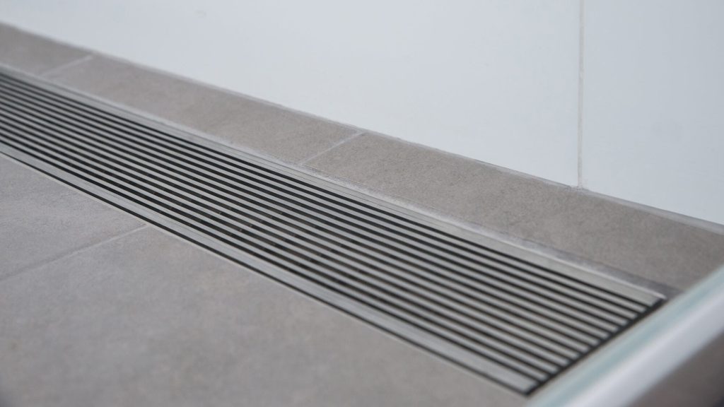 Wedge-Wire-Drain-Shower-Install-Close-Up